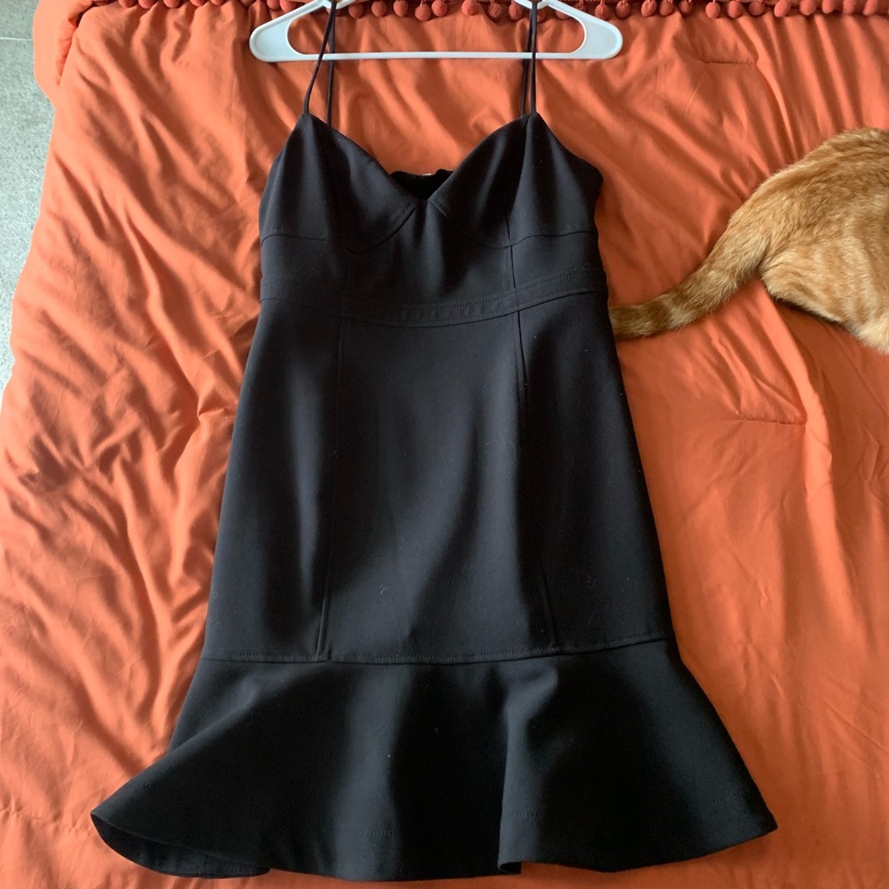 Likely black dress